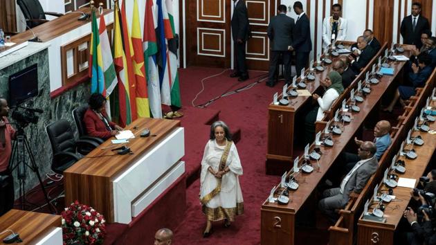 Ethiopia’s first female President Sahle-Work Zewde walks to take the oath at the Parliament in Addis Ababa. (Eduardo Soteras / AFP) Ethiopia’s first female President Sahle-Work Zewde walks to take the oath at the Parliament in Addis Ababa. (Eduardo Soteras / AFP)