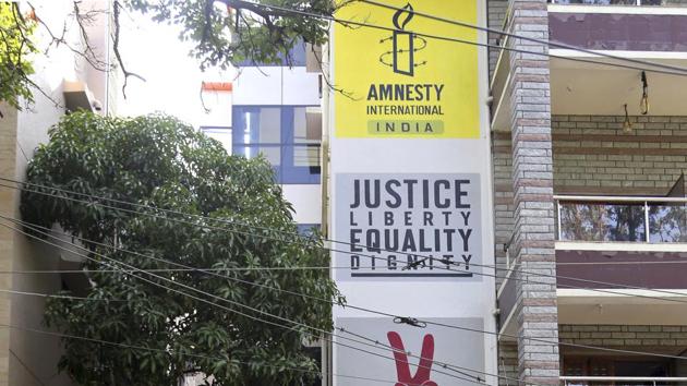 A day after searches were held at the office of Amnesty International India, confidential government documents reviewed by HT claimed that the non-governmental organisation received Rs 36 crore while it had permission to receive Rs 1.69 crore from abroad.(AP)