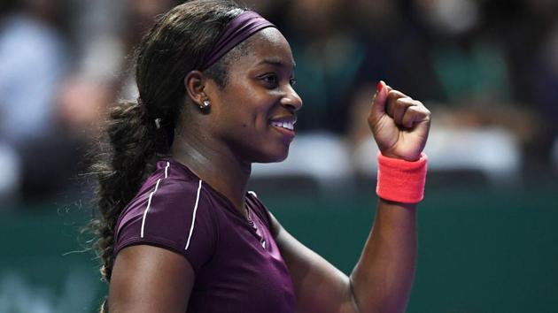 Sloane Stephens celebrates after defeating Germany's Angelique Kerber during their singles match at the WTA Finals.(AFP)