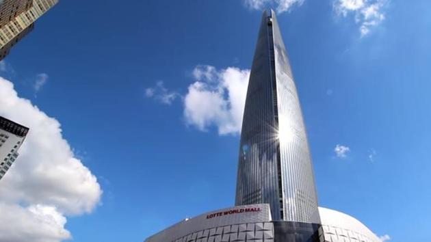The Lotte World Tower is located in Seoul, South Korea and is the fifth tallest building in the world at 1,819 feet. The building was completed in 2016 and a total of 13 years went into the planning of the structure. The building has 123 floors, out of which six are underground.  (Youtube) 