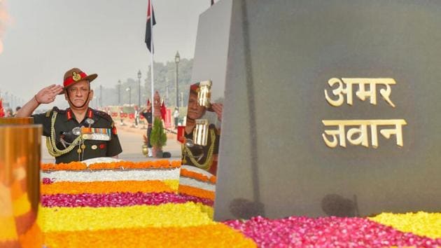 Army chief General Bipin Rawat pays homage to the martyrs on the occasion of Infantry Day, at the Amar Jawan Jyoti in New Delhi on Saturday. (PTI) Army chief General Bipin Rawat pays homage to the martyrs on the occasion of Infantry Day, at the Amar Jawan Jyoti in New Delhi on Saturday. (PTI)