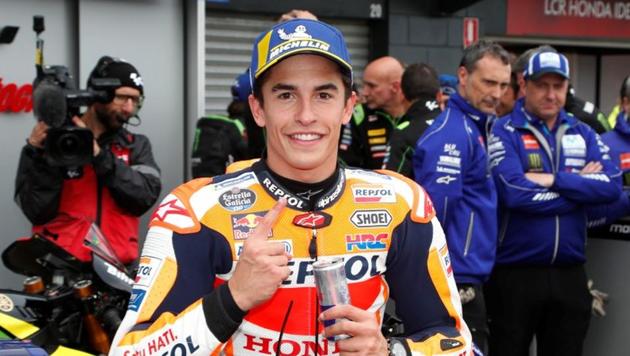 Repsol Honda Team's Marc Marquez celebrates after qualifying(REUTERS)