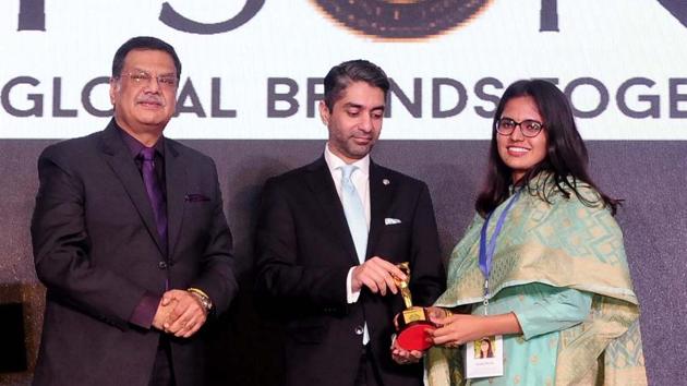 Chief guest Abhinav Bindra presenting the award to Kanupriya, the first woman president of Panjab University, at the 7th edition of HT 30-under-30 event in Chandigarh on Friday. (Keshav Singh/ht)