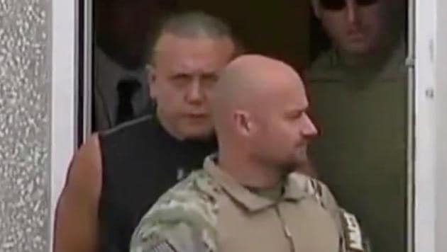 Cesar Altieri Sayoc (in black), who was arrested during an investigation into a series of parcel bombs, is escorted from an FBI facility in Miramar, Florida on Friday. (Reuters photo) Cesar Altieri Sayoc (in black), who was arrested during an investigation into a series of parcel bombs, is escorted from an FBI facility in Miramar, Florida on Friday. (Reuters photo)