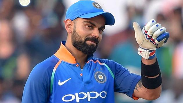 Virat Kohli reacts after completing his 10,000 runs in ODIs(PTI)