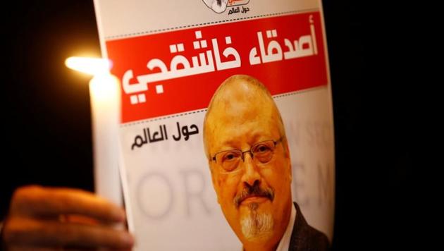 A demonstrator holds a poster with a picture of Saudi journalist Jamal Khashoggi outside the Saudi Arabia consulate in Istanbul, Turkey.(REUTERS)