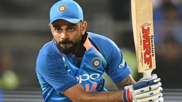 Virat Kohli plays a shot during the third one day international (ODI) cricket match between India and West Indies.(AFP)