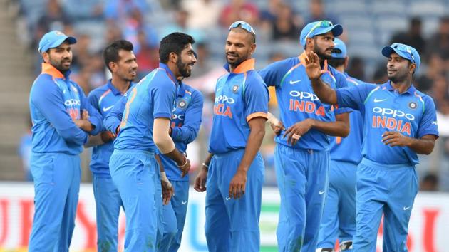 India bowler Jasprit Bumrah (3L) celebrates with team mates after taking the wicket of West Indies cricketer Shai Hope during the third one day international (ODI) cricket match between India and West Indies at the Maharashtra Cricket Association Stadium in Pune. (AFP) India bowler Jasprit Bumrah (3L) celebrates with team mates after taking the wicket of West Indies cricketer Shai Hope during the third one day international (ODI) cricket match between India and West Indies at the Maharashtra Cricket Association Stadium in Pune. (AFP)