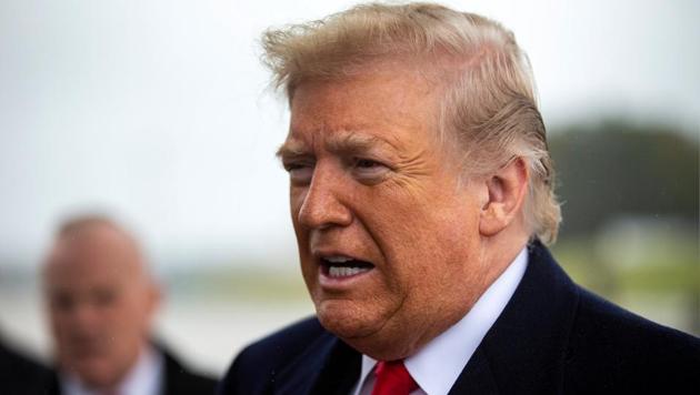 US President Donald Trump speaks about the shooting in Pittsburgh, under the wing of Air Force One at Joint Base Andrews in Maryland, before travelling to Indiana and Illinois, October 27, 2018. (REUTERS) US President Donald Trump speaks about the shooting in Pittsburgh, under the wing of Air Force One at Joint Base Andrews in Maryland, before travelling to Indiana and Illinois, October 27, 2018. (REUTERS)