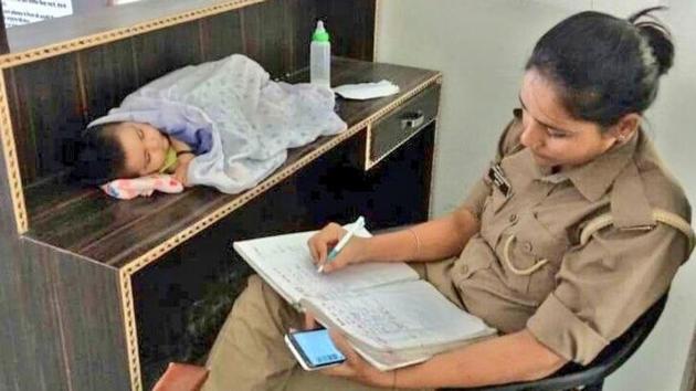 Constable Archana Singh with her six-month-old daughter. (Handout) Constable Archana Singh with her six-month-old daughter. (Handout)