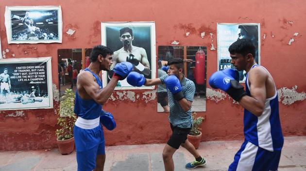 Samaspur and Dhansa are among other villages that have boxing academies, complete with boxing rings. And many academies have produced boxers who have participated in national and international championships.  But Brij Mohan says that nowhere in the city is the craze for boxing as intense as in Najafgarh. (Vipin Kumar / HT Photo) 