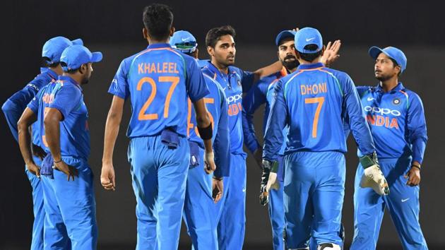 India players celebrate after the wicket of West Indies batsman Chandrapaul Hemraj. (AFP) 