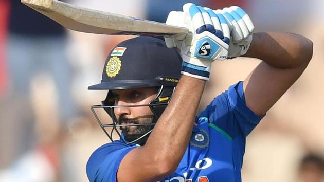 Rohit Sharma plays a shot during the fourth one day international (ODI) cricket match between India and West Indies.(AFP)