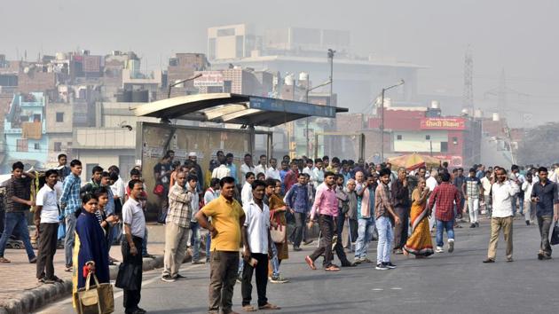 A heavy rush of passengers seen at Shastri Park Bus Stand during Delhi Transport Corporation (DTC) contractual workers strike, in New Delhi. The DTC workers are on strike under the banner of DTC Contractual Workers Union since last Monday, demanding the restoration of their original wages that were slashed by the DTC after a court order. (Sonu Mehta / HT Photo) A heavy rush of passengers seen at Shastri Park Bus Stand during Delhi Transport Corporation (DTC) contractual workers strike, in New Delhi. The DTC workers are on strike under the banner of DTC Contractual Workers Union since last Monday, demanding the restoration of their original wages that were slashed by the DTC after a court order. (Sonu Mehta / HT Photo)