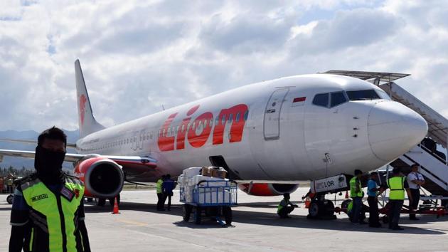 This photo taken on October 10, 2018 shows a Lion Air Boeing 737-800 aircraft at the Mutiara Sis Al Jufri airport in Palu.(AFP)
