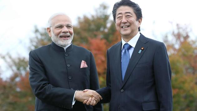 Prime Minister Narendra Modi shakes hands with his Japanese counterpart Shinzo Abe at a hotel in Yamanakako village, Yamanashi prefecture on October 28, 2018.(JIJI PRESS / AFP) Prime Minister Narendra Modi shakes hands with his Japanese counterpart Shinzo Abe at a hotel in Yamanakako village, Yamanashi prefecture on October 28, 2018.(JIJI PRESS / AFP)