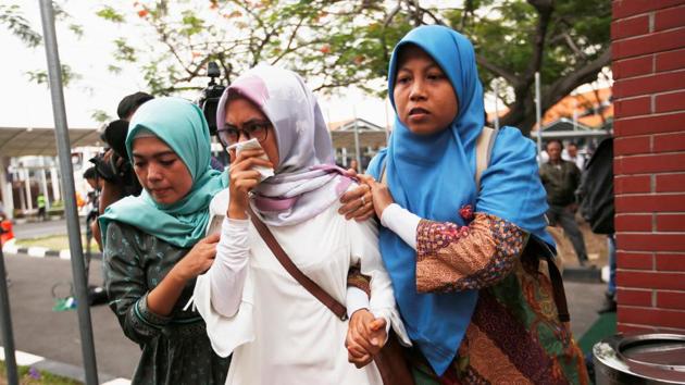 Relatives of passengers on board Lion Air flight JT610, arrive at crisis center at Soekarno Hatta International airport near Jakarta. “We cannot give any comment at this moment,” Edward Sirait, chief executive of Lion Air Group, told Reuters, adding that a news conference was planned for later on Monday. “We are trying to collect all the information and data.” (Willy Kurniawan / REUTERS)