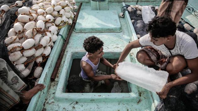 The fishermen try to avoid the coalition warships, which are on the lookout for weapons smugglers and rebels armed with rockets and explosives. The Houthis have carried out several attacks on ships off Yemen’s coast. (Hani Mohammed / AP)
