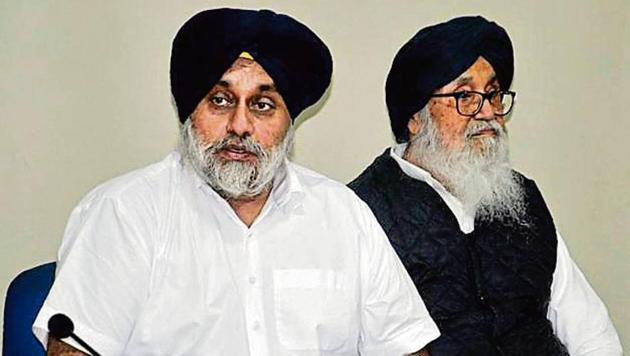 Shiromani Akali Dal president Sukhbir Badal and former CM Parkash Singh Badal in Chandigarh on Monday.(Karun Sharma/HT)