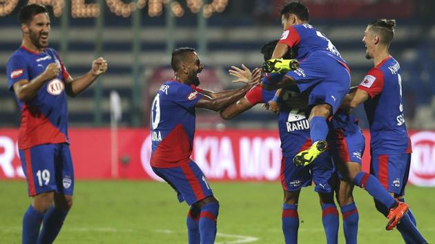 Bengaluru FC players celebrate scoring a goal against Jamshedpur FC during the Indian Super League (ISL).(AP)