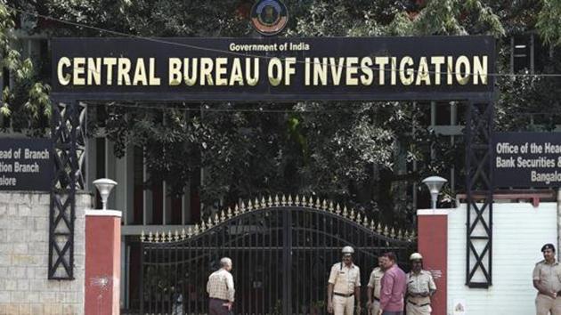 Security personnel stand guard outside the CBI headquarters in Bengaluru.(AP Photo) Security personnel stand guard outside the CBI headquarters in Bengaluru.(AP Photo)