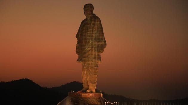 In the days leading up to the inauguration of the Statue of Unity, some protesters took down hoardings featuring PM Narendra Modi and chief minister Vijay Rupani. (HT Photo) In the days leading up to the inauguration of the Statue of Unity, some protesters took down hoardings featuring PM Narendra Modi and chief minister Vijay Rupani. (HT Photo)