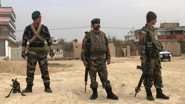 Afghan National Army soldiers keep watch near the site of a blast in Kabul, Afghanistan on sdOctober 31.(REUTERS)