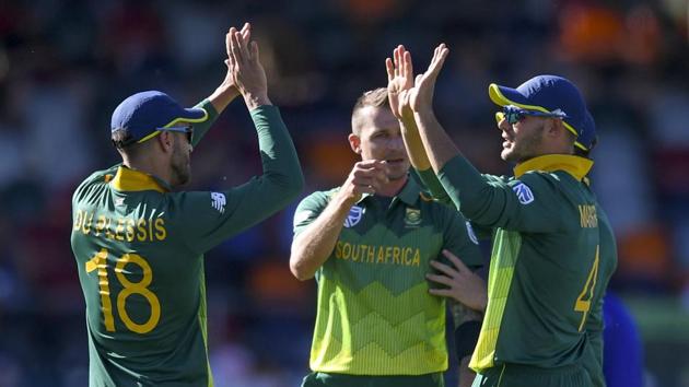 Aiden Markram, right, of South Africa celebrates with teammates after taking a wicket during a tour warm-up match against Australia Prime Minister's XI.(AP) Aiden Markram, right, of South Africa celebrates with teammates after taking a wicket during a tour warm-up match against Australia Prime Minister's XI.(AP)