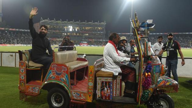 FILE: Pakistani former captain Misbah ul Haq (L) rides on an auto-rickshaw as he waves to crowd during the third and final Twenty20 International match between the World XI and Pakistan at the Gaddafi Cricket Stadium in Lahore. (AFP) FILE: Pakistani former captain Misbah ul Haq (L) rides on an auto-rickshaw as he waves to crowd during the third and final Twenty20 International match between the World XI and Pakistan at the Gaddafi Cricket Stadium in Lahore. (AFP)