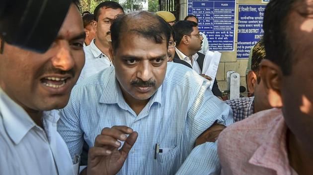 Deputy Superintendent of Police Devender Kumar after being produced at Patiala House Courts in New Delhi.(PTI file photo)