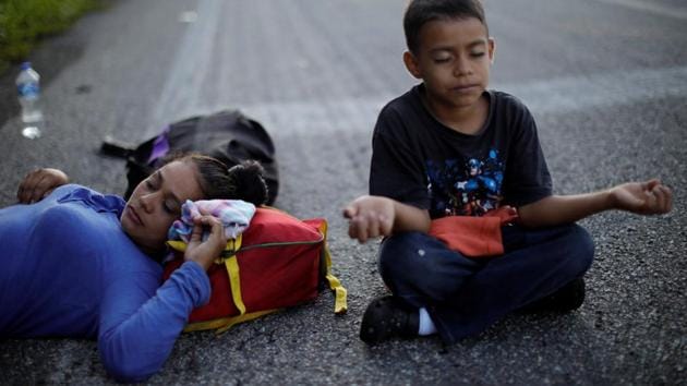 Glenda’s ultimate destination: Los Angeles, a city where she knows no one. “It’s because in my dreams, God told me that’s where he’s sending me,” she said. Estimates on the size of the caravan vary from around 3,500 to more than double that. Some migrants have abandoned the journey, deterred by the hardships or the possibility of making a new life in Mexico. Others joined it in southern Mexico. (Ueslei Marcelino / REUTERS) Glenda’s ultimate destination: Los Angeles, a city where she knows no one. “It’s because in my dreams, God told me that’s where he’s sending me,” she said. Estimates on the size of the caravan vary from around 3,500 to more than double that. Some migrants have abandoned the journey, deterred by the hardships or the possibility of making a new life in Mexico. Others joined it in southern Mexico. (Ueslei Marcelino / REUTERS)