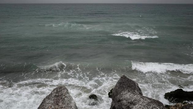 The sea often swallows the rafts whole, and their passengers disappear without a trace. Often the tides of the Mediterranean bring ashore the bodies and belongings of those who attempted a migration — those from distant countries who hoped that the beaches of North Africa would be their last stop before Europe. (Nariman El-Mofty / AP) The sea often swallows the rafts whole, and their passengers disappear without a trace. Often the tides of the Mediterranean bring ashore the bodies and belongings of those who attempted a migration — those from distant countries who hoped that the beaches of North Africa would be their last stop before Europe. (Nariman El-Mofty / AP)