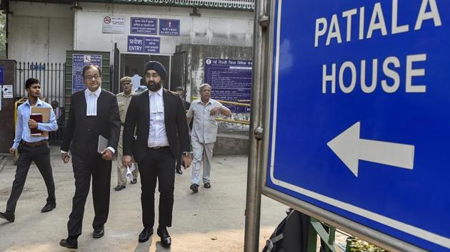 Former finance minister and Congress Party leader P Chidambaram leaves the Patiala House Court after a hearing in the Aircel Maxis money laundering case, in New Delhi. The Court extended the interim protection from arrest granted to Chidambaram and extended the interim protection to his son Karti Chidambaram till November 26 in the case. (Ravi Choudhary / PTI) Former finance minister and Congress Party leader P Chidambaram leaves the Patiala House Court after a hearing in the Aircel Maxis money laundering case, in New Delhi. The Court extended the interim protection from arrest granted to Chidambaram and extended the interim protection to his son Karti Chidambaram till November 26 in the case. (Ravi Choudhary / PTI)