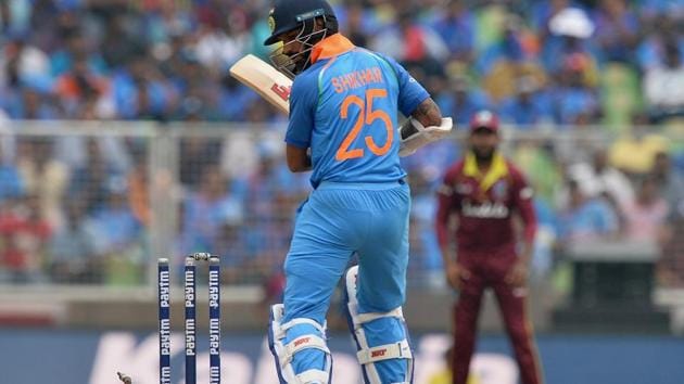 Indian batsman Shikhar Dhawan looks on after being bowled out for 6 runs. (AFP)