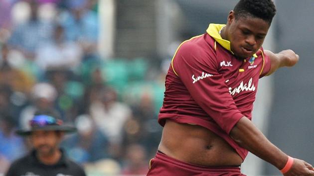 West Indies bowler Oshane Thomas celebrates the dismissal of Indian batsman Shikhar Dhawan. (AFP)