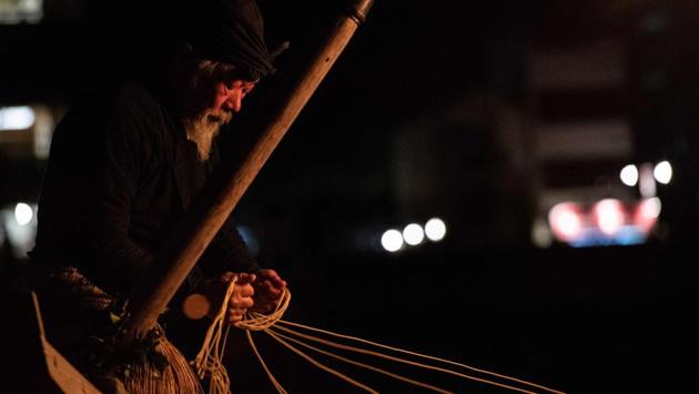 A cormorant master handles lines tied to his cormorants. Sugiyama inherited the job from his father, fishing alongside him until he obtained official usho status in 2002. Five generations of his family have practised the unusual fishing technique, which once existed in Europe and elsewhere but now continues mostly in Japan and China. (Martin Bureau / AFP) A cormorant master handles lines tied to his cormorants. Sugiyama inherited the job from his father, fishing alongside him until he obtained official usho status in 2002. Five generations of his family have practised the unusual fishing technique, which once existed in Europe and elsewhere but now continues mostly in Japan and China. (Martin Bureau / AFP)
