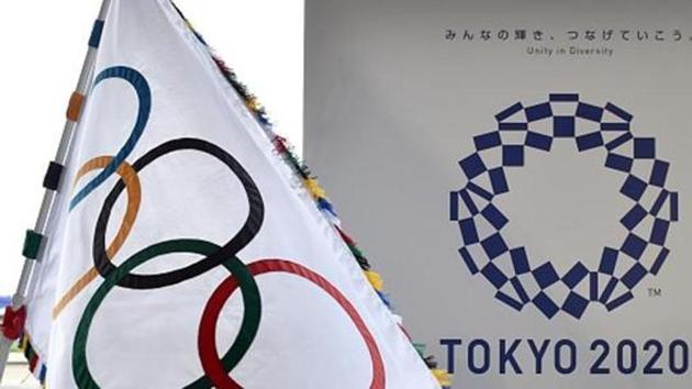 The Olympic flag and the logo of the Tokyo 2020 are displayed during the official flag arrival ceremony. (AFP/Getty Images) The Olympic flag and the logo of the Tokyo 2020 are displayed during the official flag arrival ceremony. (AFP/Getty Images)