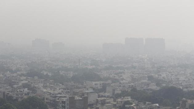 A view of Gurugram city's skyline enveloped in heavy smog and heavy air pollution, in Gurugram, on Wednesday(HT Photo)