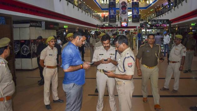 Police personnel conduct investigation where three unidentified criminals opened fire in a shootout, at JHV mall in Varanasi, Wednesday, October 31, 2018. (PTI Photo) Police personnel conduct investigation where three unidentified criminals opened fire in a shootout, at JHV mall in Varanasi, Wednesday, October 31, 2018. (PTI Photo)