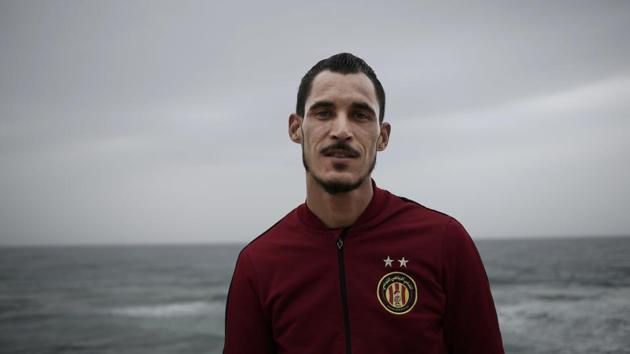 Khaled Arfaoui, 25, who wants to leave Tunisia, poses for photo at the beach. He says, “If I get the chance, I’ll do it. Even if I fear the sea and I know I might die, I’ll do it.” (Nariman El-Mofty / AP) Khaled Arfaoui, 25, who wants to leave Tunisia, poses for photo at the beach. He says, “If I get the chance, I’ll do it. Even if I fear the sea and I know I might die, I’ll do it.” (Nariman El-Mofty / AP)