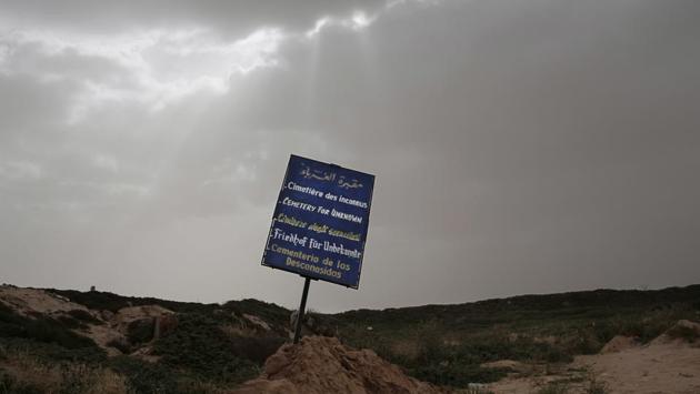 The ‘Cemetery of the Unknown’ where migrants who were found dead on nearby shores are buried, in at the southern port town of Zarzis, Tunisia. The bodies are retrieved by retired fisherman Chamsedding Marzouk, who has made it his life's work to provide a proper burial to the foreigners even though they die without a name. (Nariman El-Mofty / AP) The ‘Cemetery of the Unknown’ where migrants who were found dead on nearby shores are buried, in at the southern port town of Zarzis, Tunisia. The bodies are retrieved by retired fisherman Chamsedding Marzouk, who has made it his life's work to provide a proper burial to the foreigners even though they die without a name. (Nariman El-Mofty / AP)