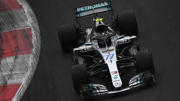 Mercedes’ Finnish driver Valtteri Bottas powers his car during the qualifying session of the F1 Mexico Grand Prix, at the Hermanos Rodriguez circuit in Mexico City, Mexico. (Pedro Pardo / AFP)