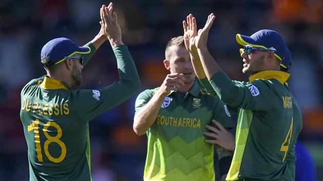 Aiden Markram, right, of South Africa celebrates with teammates after taking a wicket during a tour warm-up match.(AP)