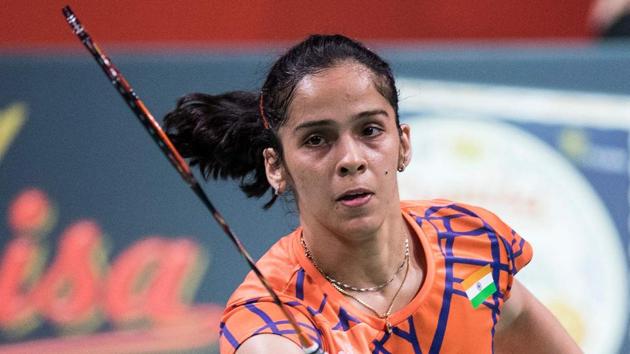 India's Saina Nehwal plays a shot against Taipei's Tzu Ying Tai during their Women Singles final match at the Denmark Open.(AFP)
