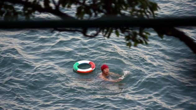 Chin Choi, 78, swims in the sea at the Sai Wan Swimming Shed in Hong Kong. Choi said she has been coming to the swimming shed for 36 years. “I come here every day at 7 o’clock in the morning. My daughter suggested I came here to swim because it would improve my breathing,” she said. (REUTERS / Hannah McKay) Chin Choi, 78, swims in the sea at the Sai Wan Swimming Shed in Hong Kong. Choi said she has been coming to the swimming shed for 36 years. “I come here every day at 7 o’clock in the morning. My daughter suggested I came here to swim because it would improve my breathing,” she said. (REUTERS / Hannah McKay)