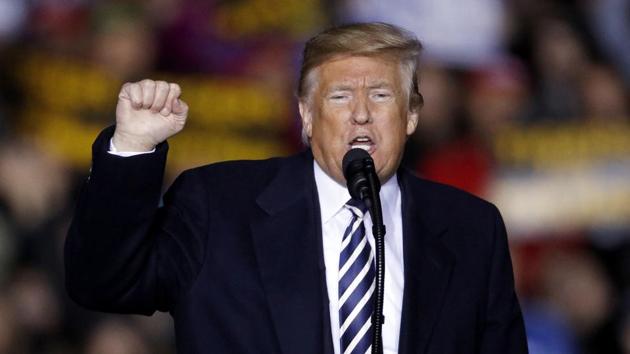 President Donald Trump said that a group of several thousand migrants attempting to walk from Central America through Mexico had thrown rocks “viciously and violently” at Mexican police.(AP)