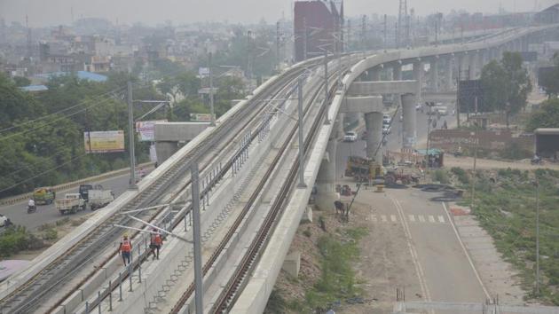 Authority officials Thursday said they had received written communication from the DMRC intimating them of the reduced completion cost(HT File Photo)