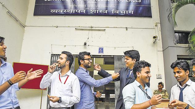 Students of Pumba get into the Diwali festive season by exchanging sweets on the campus on Wednesday.(SANKET WANKHADE/ HT PHOTO)