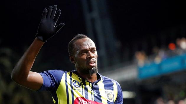 FILE PHOTO: Central Coast Mariners' Usain Bolt waves to fans after the match.(REUTERS)