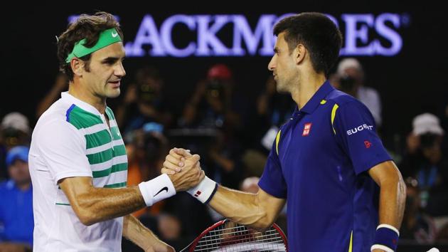 File Photo: Novak Djokovic of Serbia (R) shakes hands after winning in his semi final match against Roger Federer of Switzerland. (Getty Images) File Photo: Novak Djokovic of Serbia (R) shakes hands after winning in his semi final match against Roger Federer of Switzerland. (Getty Images)
